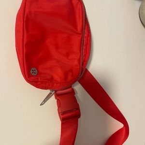 Red lululemon belt bag